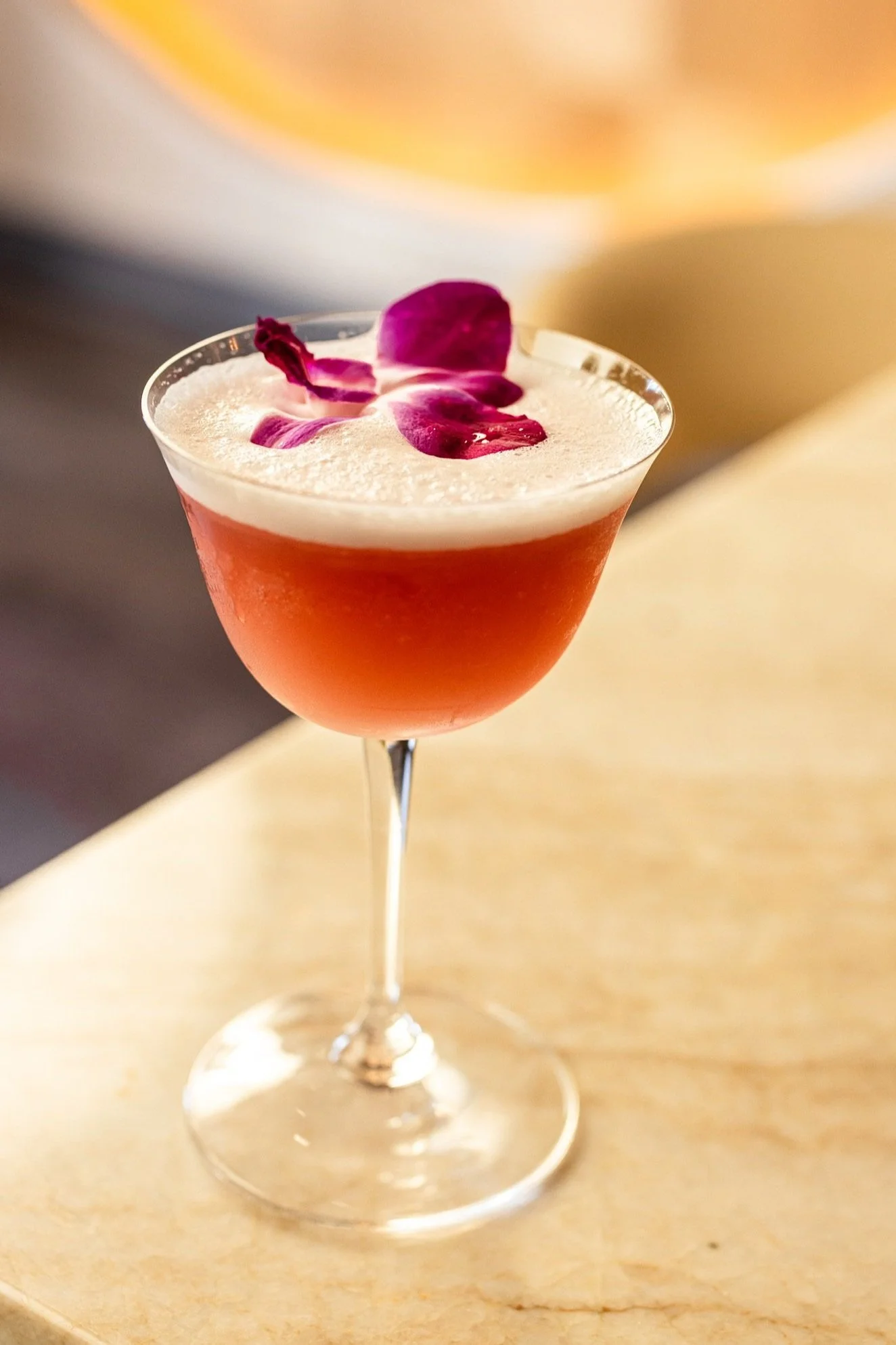 Cocktail with flower garnish